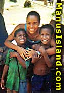 Extended family hug on Manus Island, province of Papua New Guinea