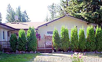 a side view of Kelowna property with mountain view on Daves Rd.