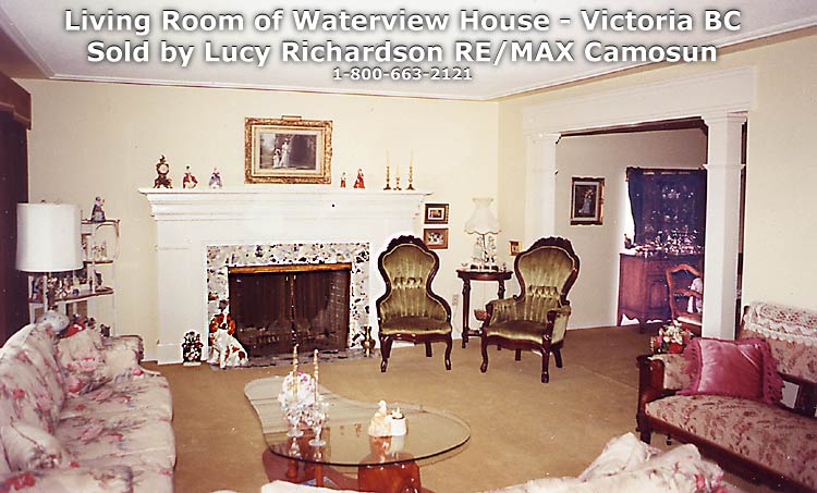 Living room with fireplace on waterview Victoria house