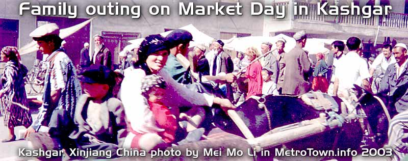 family on donkey cart near Kashgar's famous outdoor market, in Xinjiang, China - famous destination on the ancient SILK Route across central Asia and western China