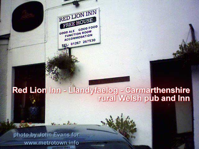 Red Lion Inn, rural Welsh Inn-Pub - sign says good ale,  good food, function room and accommodation -- CLICK to see pub-bar area